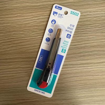 comprare Coltello nero e rosso con lama retrattile da 86 mm SK2 fabbricazione online